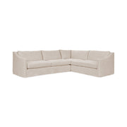 Classic Home Kipton upholstered corner sectional with plush cushions and fabric upholstery, showcasing its modern stationary design.