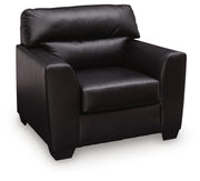 Midnight-colored Glennbre armchair by Signature Design Ashley, featuring plush upholstery and modern armchair design.