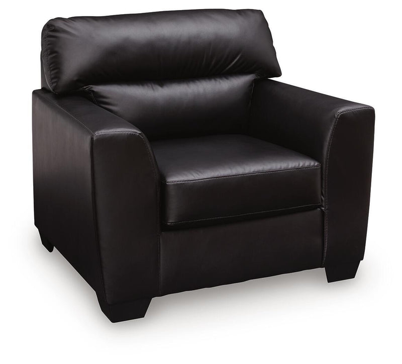 Midnight-colored Glennbre armchair by Signature Design Ashley, featuring plush upholstery and modern armchair design.