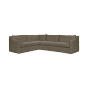 Classic Home Kipton upholstered corner sectional in beige fabric, showcasing plush cushions and modern design in a living room setting.