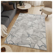 Geometrix - 5'3" X 7'3" Area Rug, Geometric 3D Effect - Gray / Ivory - R&R Furniture Gallery (Fountain Valley, CA)