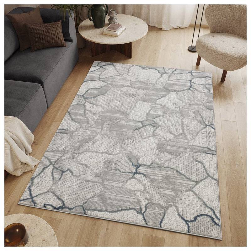 Geometrix - 5'3" X 7'3" Area Rug, Geometric 3D Effect - Gray / Ivory - R&R Furniture Gallery (Fountain Valley, CA)