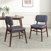 Pair of upholstered Noble House comfort dining chairs with padded seats and fabric upholstery, ideal for kitchen or dining room.