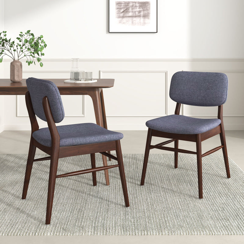 Pair of upholstered Noble House comfort dining chairs with padded seats and fabric upholstery, ideal for kitchen or dining room.