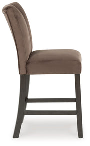 Set of two Jeshina upholstered barstools by Signature Design by Ashley in mocha with padded seats and backrests.