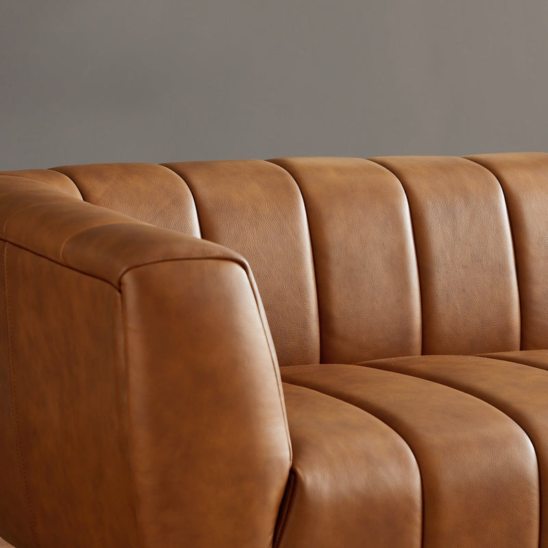 Ashcroft Furniture Ava stationary sofa in gold and tan with plush cushions and sleek design, perfect for modern living rooms.