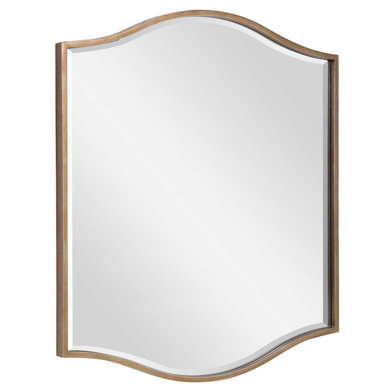 Uttermost Cerise gold wall mirror with a sleek, circular frame hanging on a modern wall.