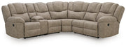 Signature Design by Ashley Pearce-Pike reclining sectional with plush cushions and fabric upholstery in a modern living room setting.
