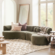 Classic Home Octavia sectional sofa, stationary sectional with plush cushions and modern design, shown in a cozy living room setting.