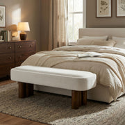 Indoor upholstered dining bench by Noble House with padded seat and wooden legs, ideal for modern dining rooms.
