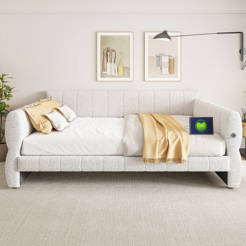 Dreamland upholstered storage bed with USB charging port, featuring a padded headboard and built-in under-bed storage drawers.