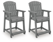 Set of two dark gray Sanctuary Beach barstools by Signature Design by Ashley® with cushioned seats and sleek modern design.