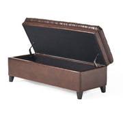 Noble House Juliana storage ottoman with birch wood legs, beige fabric, and a cushioned top for seating and storage.