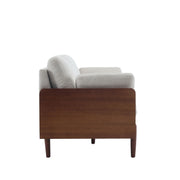 Noble House Mid Century Moderne stationary sofa with wood side panels, upholstered seating and sleek, modern design.