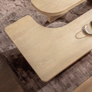 Classic Home Melina coffee table with a sleek wooden surface and modern design, perfect for living room decor.