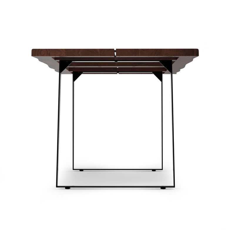 Simpli-Home Delta handcrafted dining table with wooden surface and sturdy legs, perfect for modern dining rooms.