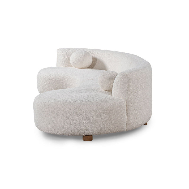 Classic Home Octavia stationary sectional sofa with plush cushions and modern design, shown in a spacious living room setting.