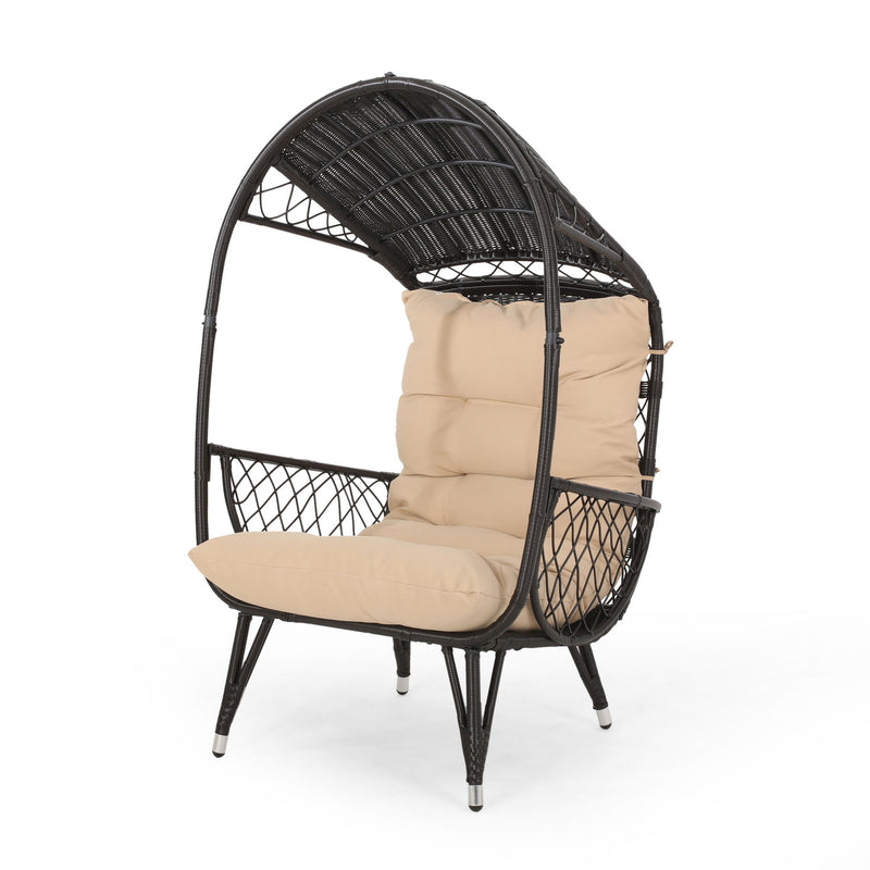 Noble House outdoor wicker standing basket accent chair with cushion, featuring a woven wicker frame and plush cushion for outdoor seating.