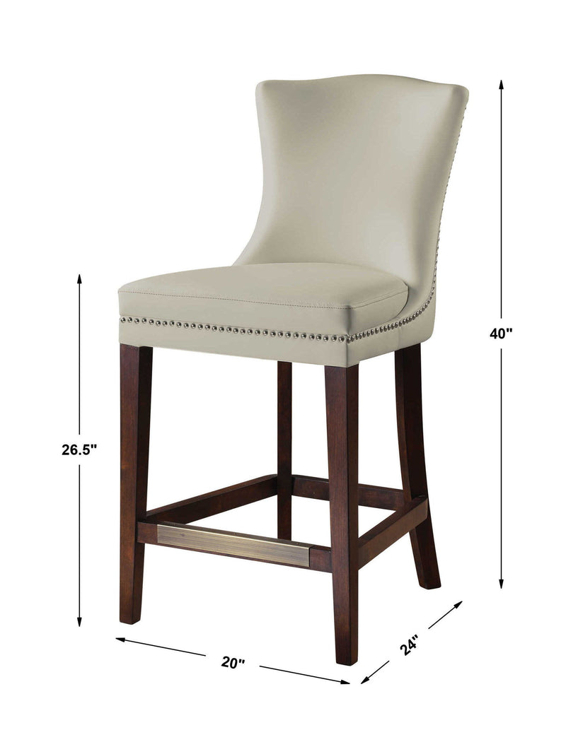 White Dariela counter stool by Uttermost with a sleek design, featuring a comfortable padded seat and modern metal legs.