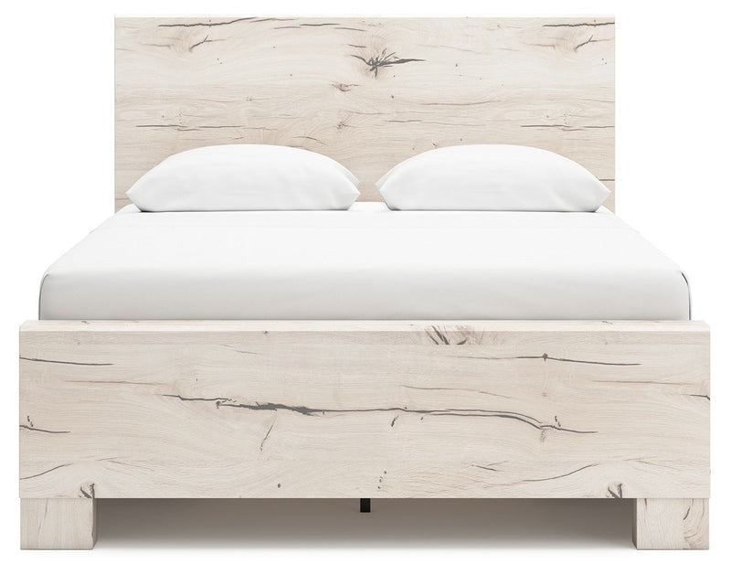 Signature Design by Ashley Lawroy panel bed with built-in storage drawers in a modern bedroom setting.