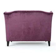 Noble House Upholstered Loveseat with wingback design, diamond tufting, and plush cushioning for a cozy living room accent.
