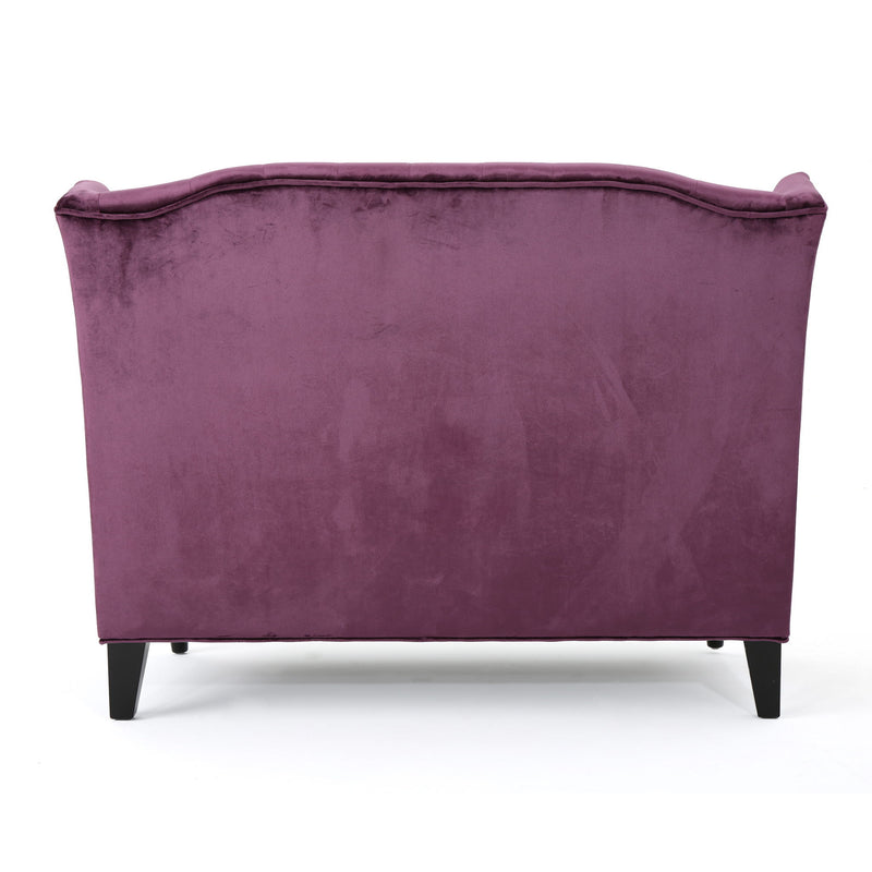 Noble House Upholstered Loveseat with wingback design, diamond tufting, and plush cushioning for a cozy living room accent.