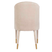 Pair of Uttermost Brie armless chairs in a modern design, set of two with plush upholstery and sleek wooden legs.
