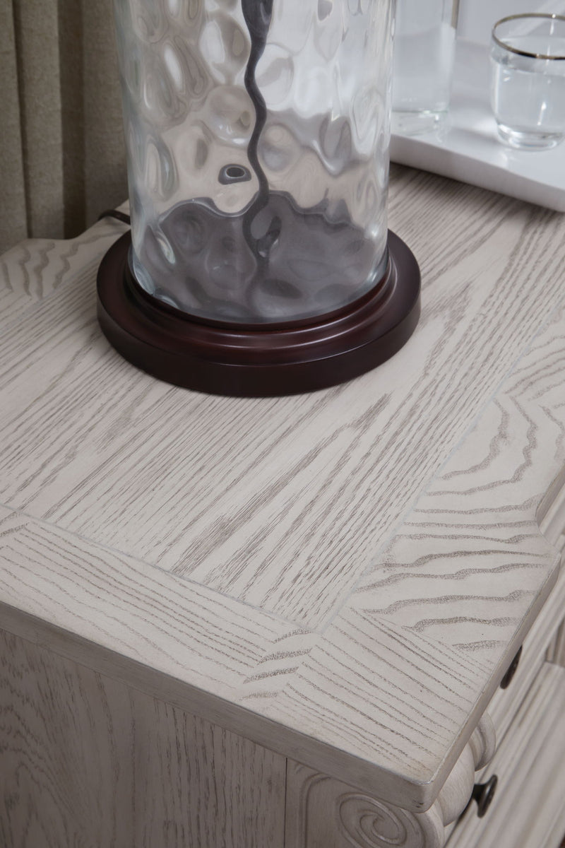 Bruchandi - Three Drawer Night Stand - Antique White - R&R Furniture Gallery (Fountain Valley, CA)