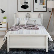 DreamHaus platform bed with headboard, footboard, and wood slat support, showcasing a modern design and sturdy construction.