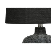 Contemporary black 8th Street table lamp with sleek design and lighting element, perfect for modern home decor.