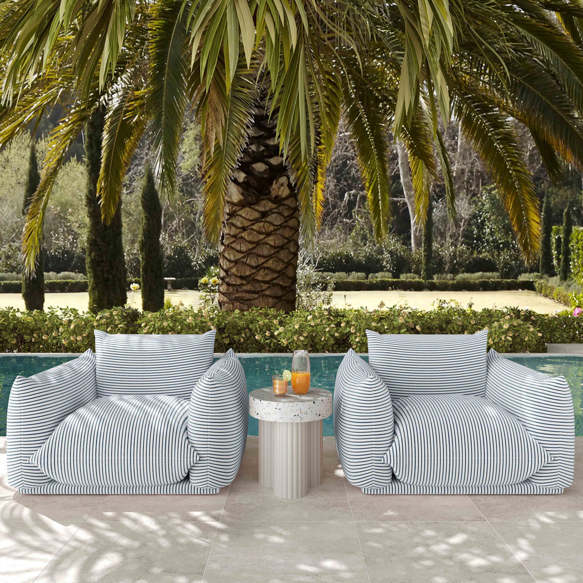 TOV Furniture Saint Tropez stuffed outdoor armchair with plush cushions and durable fabric, perfect for patio seating.