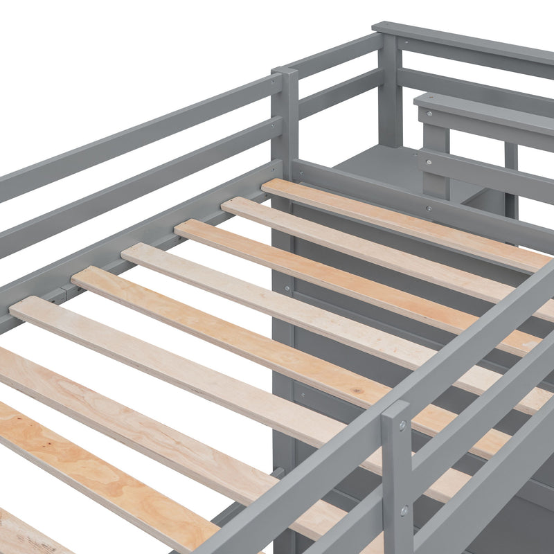 DreamHaus bunk bed with trundle and staircase, featuring sturdy wood frame and space-saving design for children's bedroom.