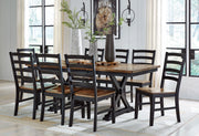 Six-piece Wildenauer dining room set by Signature Design Ashley featuring a table and matching chairs in a modern wood finish.