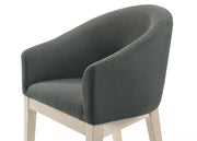 Set of two gray Neroli Barrel Accent Chairs by Lilola Home with rounded backs and plush upholstery.