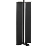 Lumi Source Cosmo contemporary table lamp with a sleek, modern design and a cylindrical white lampshade on a metal base.