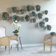 Set of three Uttermost Teo wall decor pieces featuring modern abstract designs for stylish home wall accents.