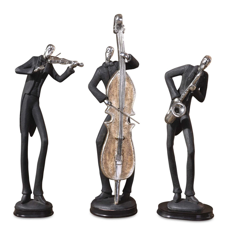 Set of three black musician decorative figurines by Uttermost, collectible sculptures with detailed musical instrument designs.