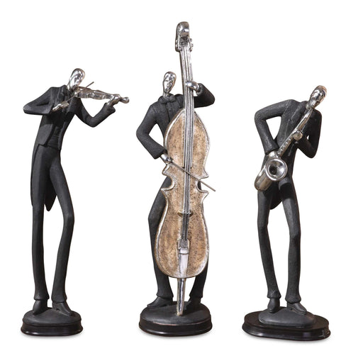 Set of three black musician decorative figurines by Uttermost, collectible sculptures with detailed musical instrument designs.