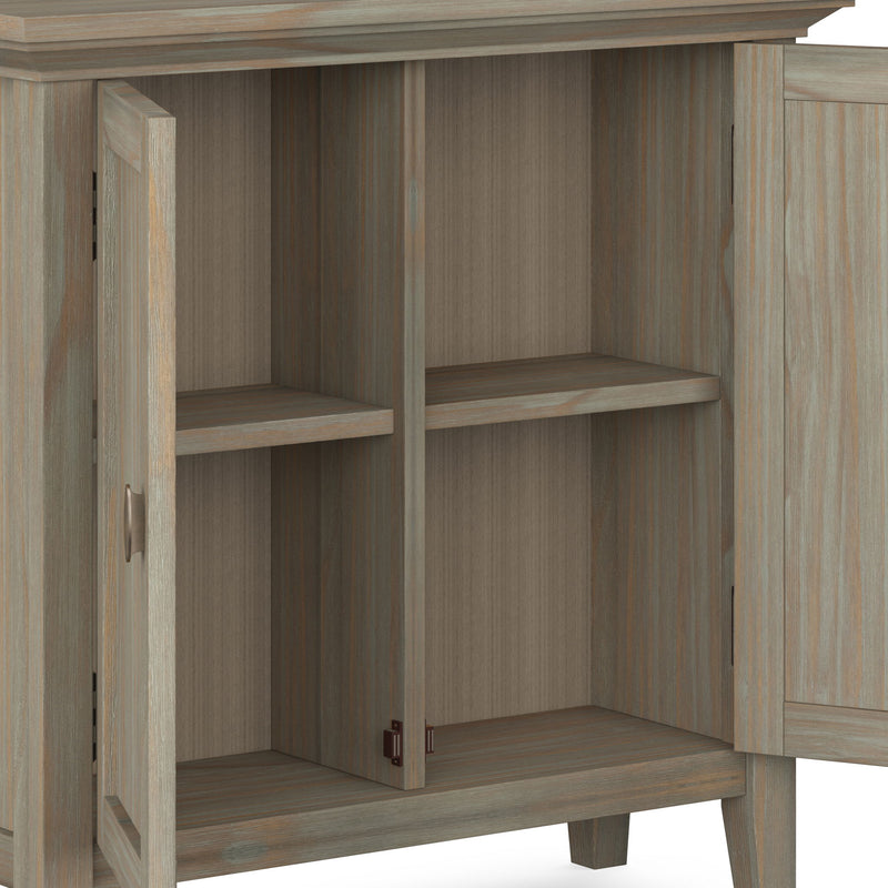Redmond handcrafted low storage accent cabinet by Simpli-Home with a rich wood finish and sleek design.