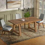 Simpli-Home Whitley dining table with wooden surface and sturdy legs, ideal for modern dining room settings.