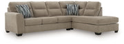 Benchcraft Olten stationary sectional sofa with plush cushions and neutral fabric, showcasing a modern living room setup.