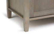 Warm Shaker handcrafted entryway storage bench by Simpli-Home with wooden finish and cushioned seat, ideal for seating and organization.
