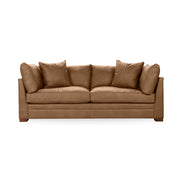Classic Home Audrey stationary sofa with plush fabric upholstery and elegant design, shown in a cozy living room setting.