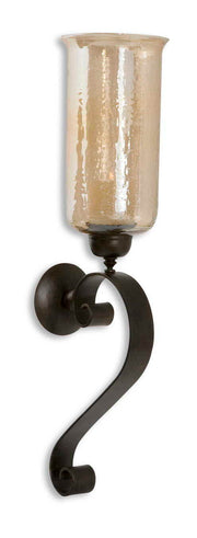 Joselyn bronze candle wall sconce by Uttermost featuring a sleek design with a candle holder and decorative bronze finish