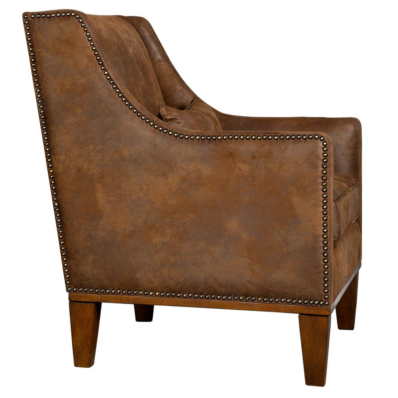 Dark brown leather armchair by Uttermost featuring a classic design and plush cushioning, perfect for living room seating.