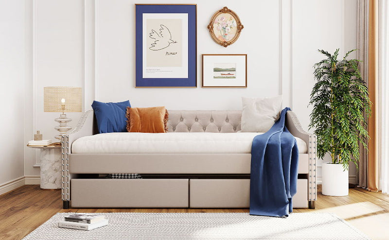 DreamHaus upholstered daybed with two drawers, wooden slat support, modern storage bed in a cozy bedroom setting.