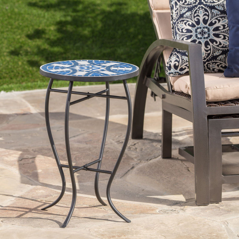 Outdoor round side table by Noble House with mosaic-style top and curved iron legs in blue and matte black finish.