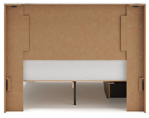 Signature Design by Ashley Lawroy storage panel bed with built-in drawers and modern wood finish, showcasing a spacious bedroom centerpiece.