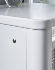 White Signature Design by Ashley Chalanna vanity set with mirror, featuring a sleek modern design with a spacious tabletop and storage drawers.