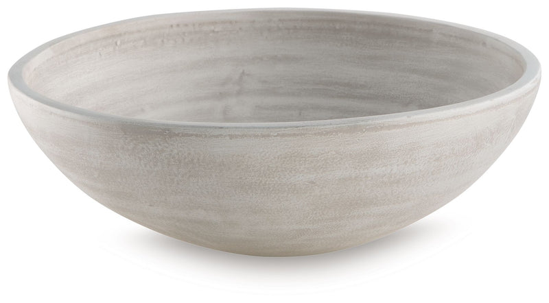 Signature Design by Ashley Meadie bowl from Plates & Bowls collection, featuring a modern, stylish ceramic design.